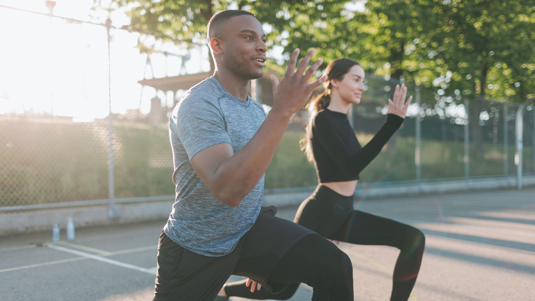 2 people exercising outside